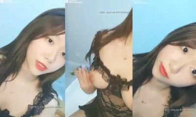 สาวจีนเธอใส่ชุดลูกไม้สีดำและได้ทำการไลฟ์สดเล่นกับหน้าอกของเธอมาโชว์แบบเมามัน